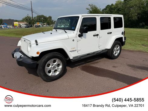 Used 2012 Jeep Wrangler Unlimited Sahara w/ Connectivity Group AWD/4WD image 2