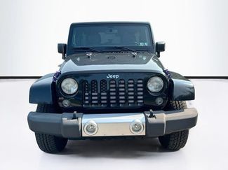 Used 2014 Jeep Wrangler Unlimited Sahara w/ Max Tow Package AWD/4WD video 2
