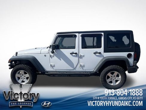 Used 2013 Jeep Wrangler Unlimited Sport AWD/4WD image 2