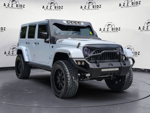 Used 2017 Jeep Wrangler Unlimited Sahara w/ Connectivity Group AWD/4WD image 1