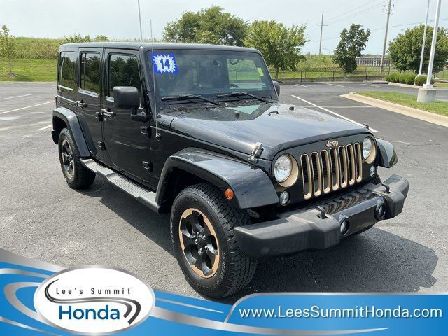 Used 2014 Jeep Wrangler Unlimited Sahara AWD/4WD image 1