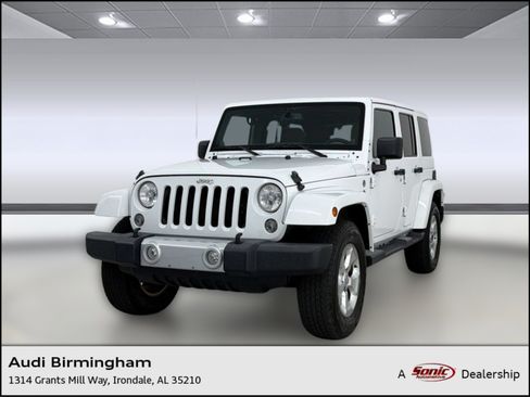 Used 2014 Jeep Wrangler Unlimited Sahara w/ Connectivity Group AWD/4WD image 1