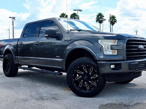 Used 2015 Ford F150 XLT w/ Equipment Group 302A Luxury AWD/4WD image 1
