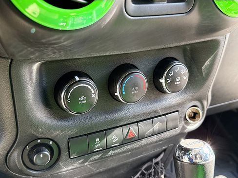Used 2012 Jeep Wrangler Unlimited Sport w/ Dual Top Group AWD/4WD image 12
