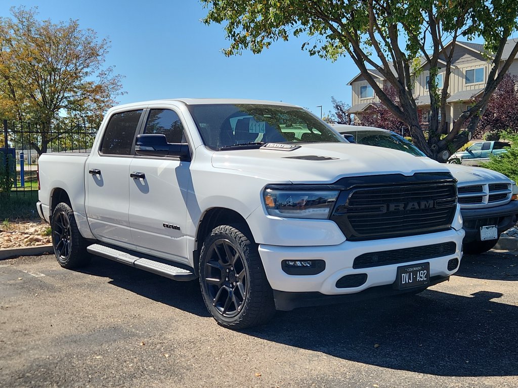 Used 2023 RAM 1500 Laramie AWD/4WD image 1