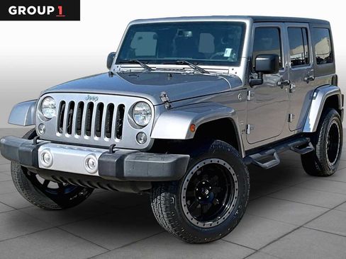 Used 2015 Jeep Wrangler Unlimited Sahara AWD/4WD image 1