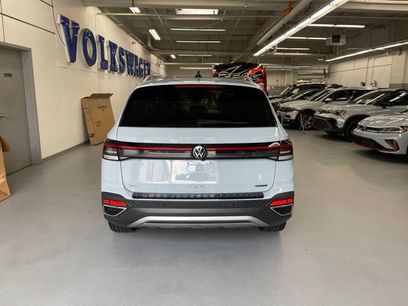 Used 2025 Volkswagen Taos SEL w/ Black Wheel Plus Package