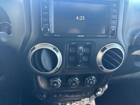 Used 2014 Jeep Wrangler Unlimited Sahara w/ Mopar Chrome Edition Group AWD/4WD image 18