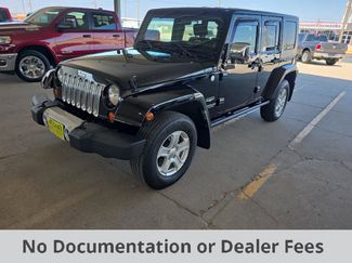 Used 2010 Jeep Wrangler Unlimited Sahara w/ Limited Group image 1