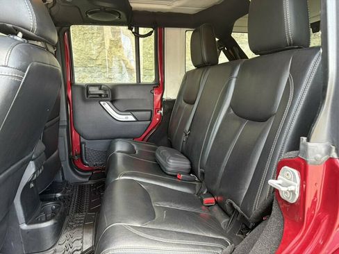 Used 2013 Jeep Wrangler Unlimited Sahara w/ Dual Top Group AWD/4WD image 34