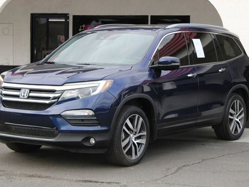 Used 2016 Honda Pilot Touring image 1
