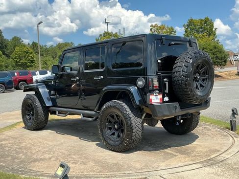 Used 2012 Jeep Wrangler Unlimited Rubicon w/ Dual Top Group AWD/4WD image 5