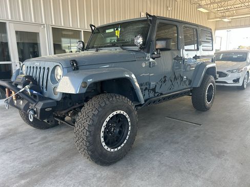 Used 2015 Jeep Wrangler Unlimited Sahara w/ Max Tow Package image 1