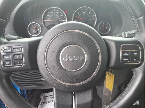 Used 2015 Jeep Wrangler Unlimited Sahara w/ Dual Top Group AWD/4WD image 12