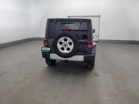 Used 2014 Jeep Wrangler Unlimited Sahara w/ Dual Top Group AWD/4WD image 7
