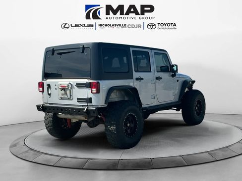 Used 2010 Jeep Wrangler Unlimited Rubicon w/ Dual Top Group image 5