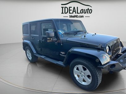 Used 2012 Jeep Wrangler Unlimited Sahara w/ Dual Top Group