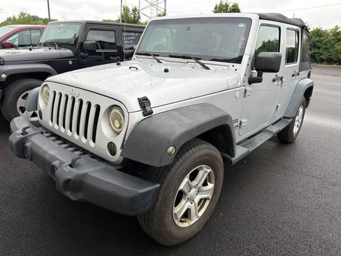 Used 2010 Jeep Wrangler Unlimited Sport AWD/4WD image 1