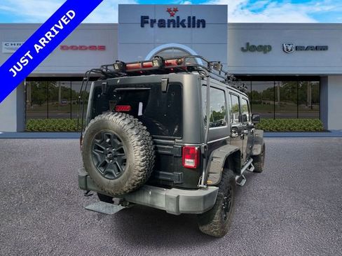 Used 2014 Jeep Wrangler Unlimited Rubicon w/ Dual Top Group AWD/4WD image 2