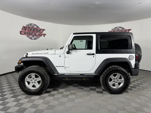 Used 2011 Jeep Wrangler Rubicon w/ Dual Top Group AWD/4WD image 4