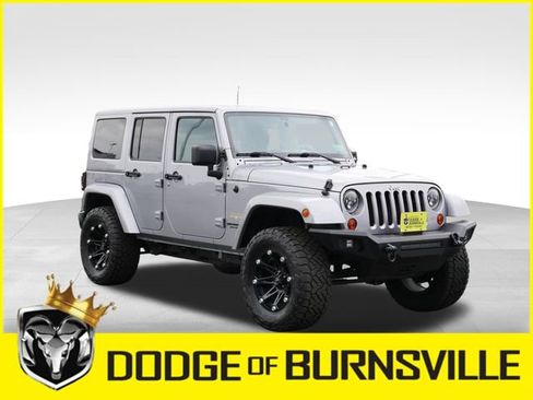 Used 2013 Jeep Wrangler Unlimited Sahara w/ Dual Top Group AWD/4WD image 1