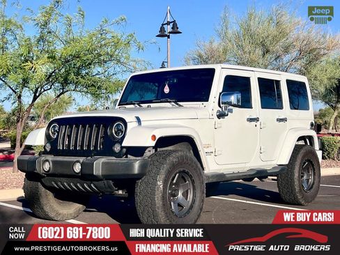 Used 2015 Jeep Wrangler Unlimited Sahara w/ Max Tow Package AWD/4WD image 1