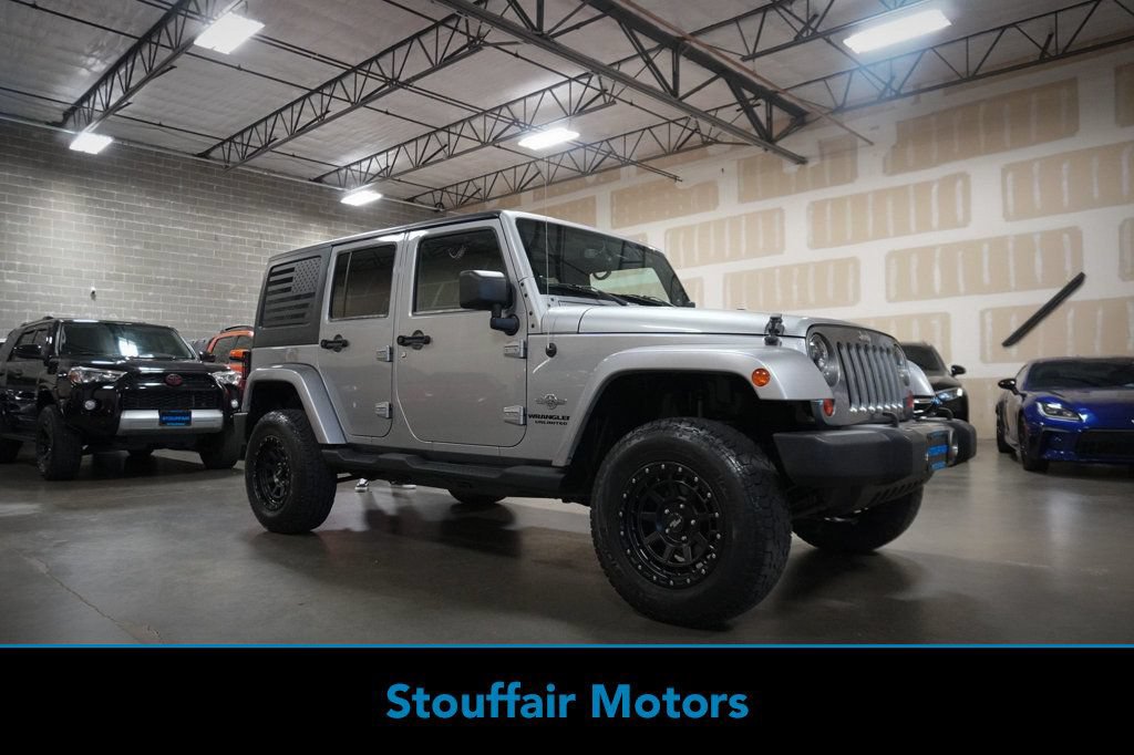 Used 2013 Jeep Wrangler Unlimited Sport AWD/4WD image 1