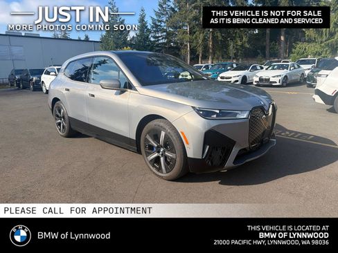 Used 2024 BMW iX xDrive50 w/ Premium Package AWD/4WD image 1