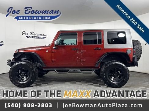 Used 2010 Jeep Wrangler Unlimited Sport w/ Black Appearance Group AWD/4WD image 1