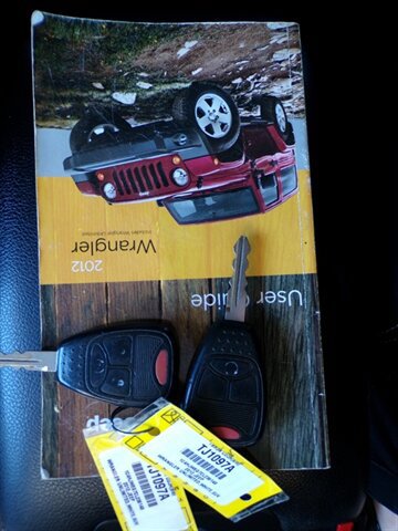 Used 2012 Jeep Wrangler Unlimited Sahara w/ Dual Top Group AWD/4WD image 38