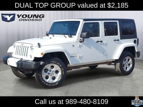 Used 2014 Jeep Wrangler Unlimited Sahara w/ Dual Top Group image 1