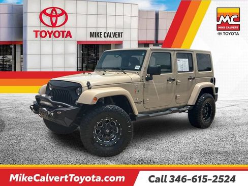 Used 2016 Jeep Wrangler Unlimited Sahara w/ Max Tow Package AWD/4WD image 1
