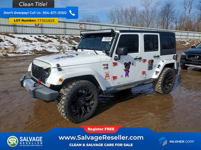Used 2014 Jeep Wrangler Unlimited Sahara w/ Dual Top Group
