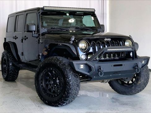Used 2015 Jeep Wrangler Unlimited Sport image 1