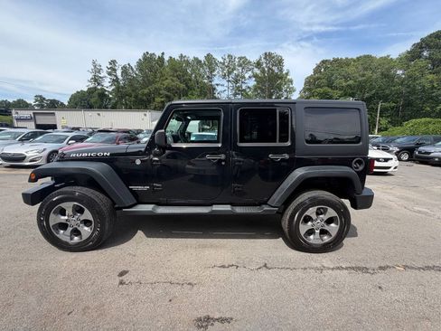 Used 2012 Jeep Wrangler Unlimited Rubicon w/ Dual Top Group AWD/4WD image 8