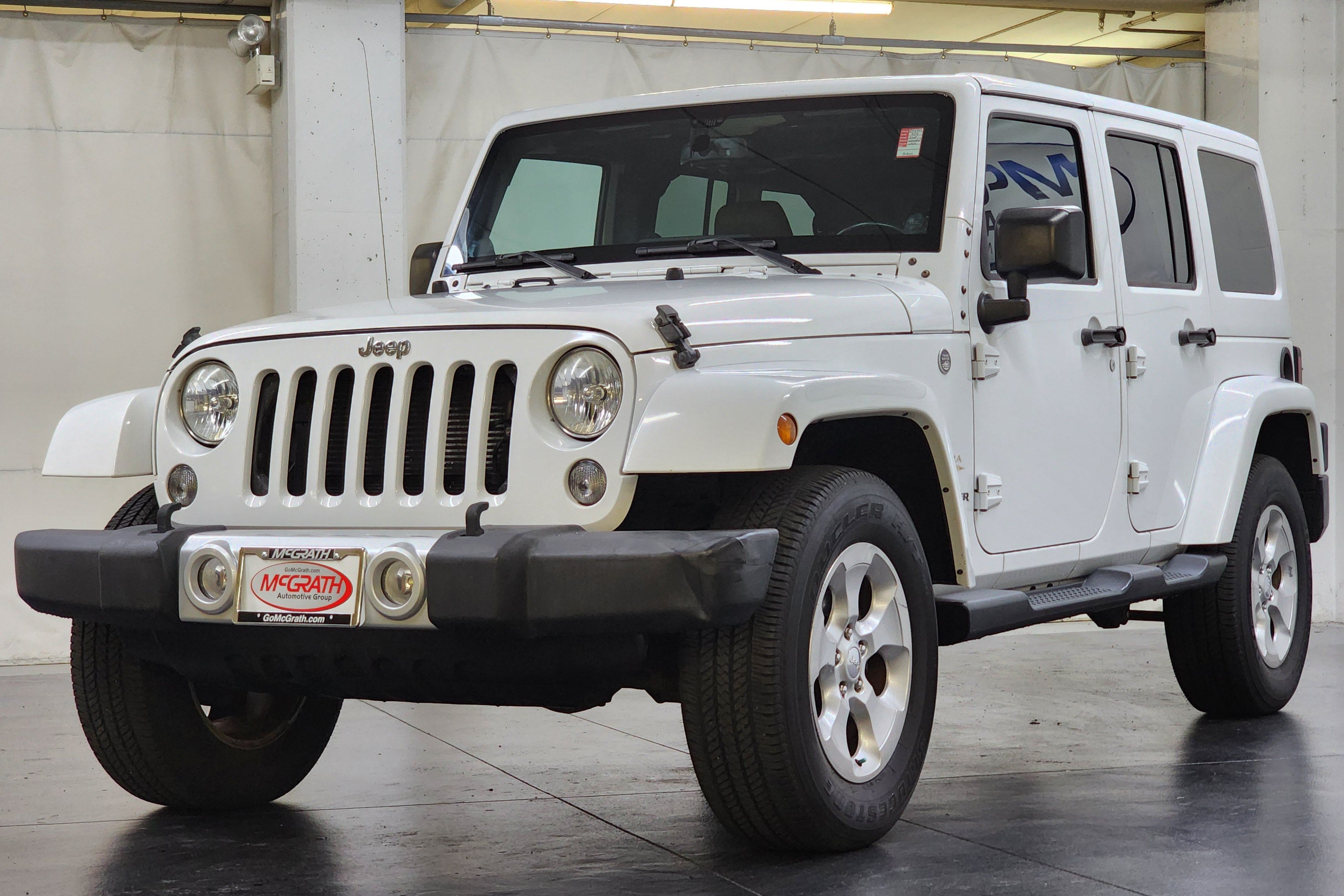 Used 2014 Jeep Wrangler Unlimited Sahara w/ Max Tow Package AWD/4WD image 12