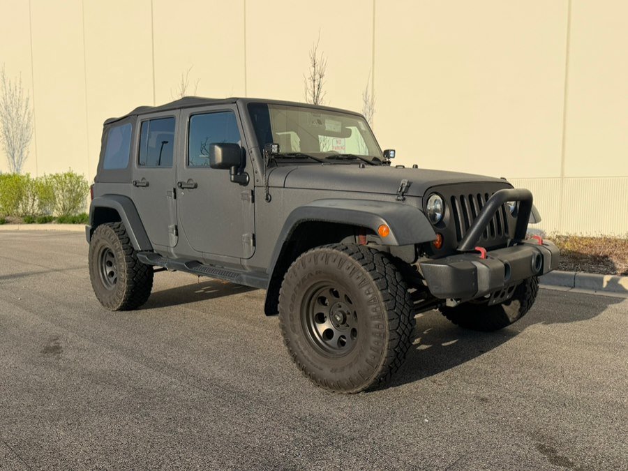 Used 2011 Jeep Wrangler Unlimited Sport AWD/4WD image 1