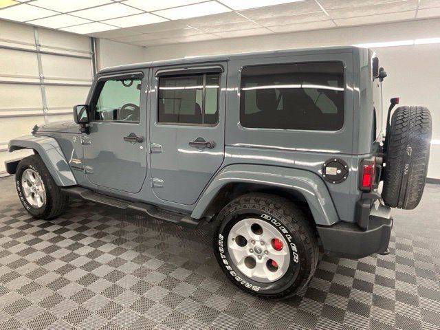 Used 2014 Jeep Wrangler Unlimited Sahara w/ Dual Top Group AWD/4WD image 21