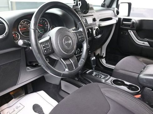 Used 2013 Jeep Wrangler Unlimited Sahara w/ Dual Top Group AWD/4WD image 14