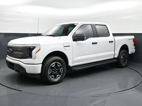 Used 2023 Ford F150 Lightning XLT AWD/4WD image 1