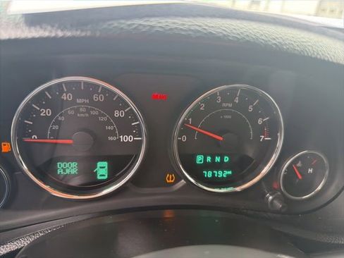 Used 2014 Jeep Wrangler Unlimited Sahara w/ Dual Top Group AWD/4WD image 11