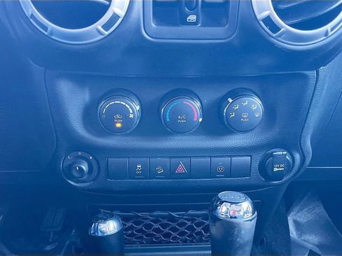 Used 2015 Jeep Wrangler Unlimited Sahara w/ Dual Top Group AWD/4WD image 14