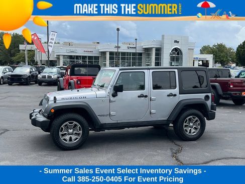 Used 2015 Jeep Wrangler Unlimited Rubicon w/ Dual Top Group AWD/4WD image 1