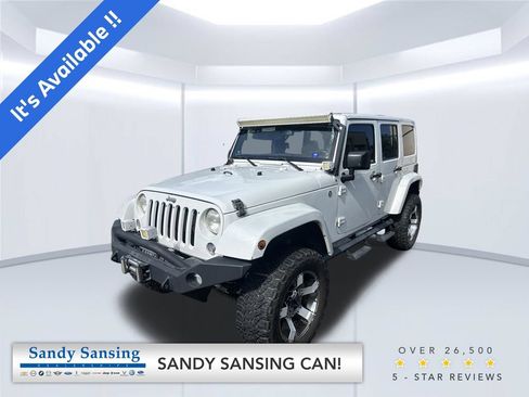 Used 2014 Jeep Wrangler Unlimited Sahara AWD/4WD image 1