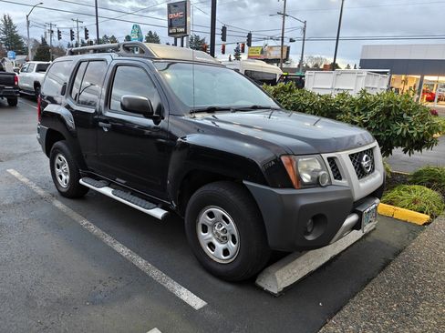 Used 2012 Nissan Xterra X image 1