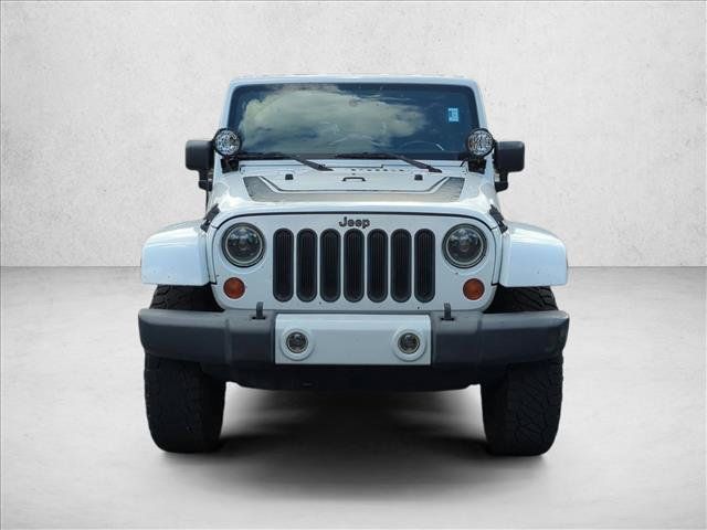 Used 2012 Jeep Wrangler Unlimited Sahara AWD/4WD image 2