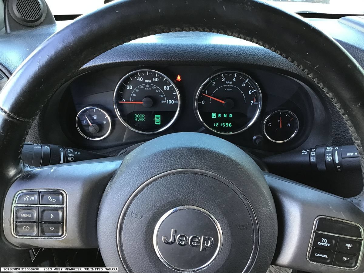 Used 2013 Jeep Wrangler Unlimited Sahara AWD/4WD image 13