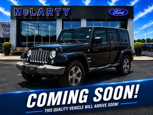 Used 2016 Jeep Wrangler Unlimited Sahara AWD/4WD image 1