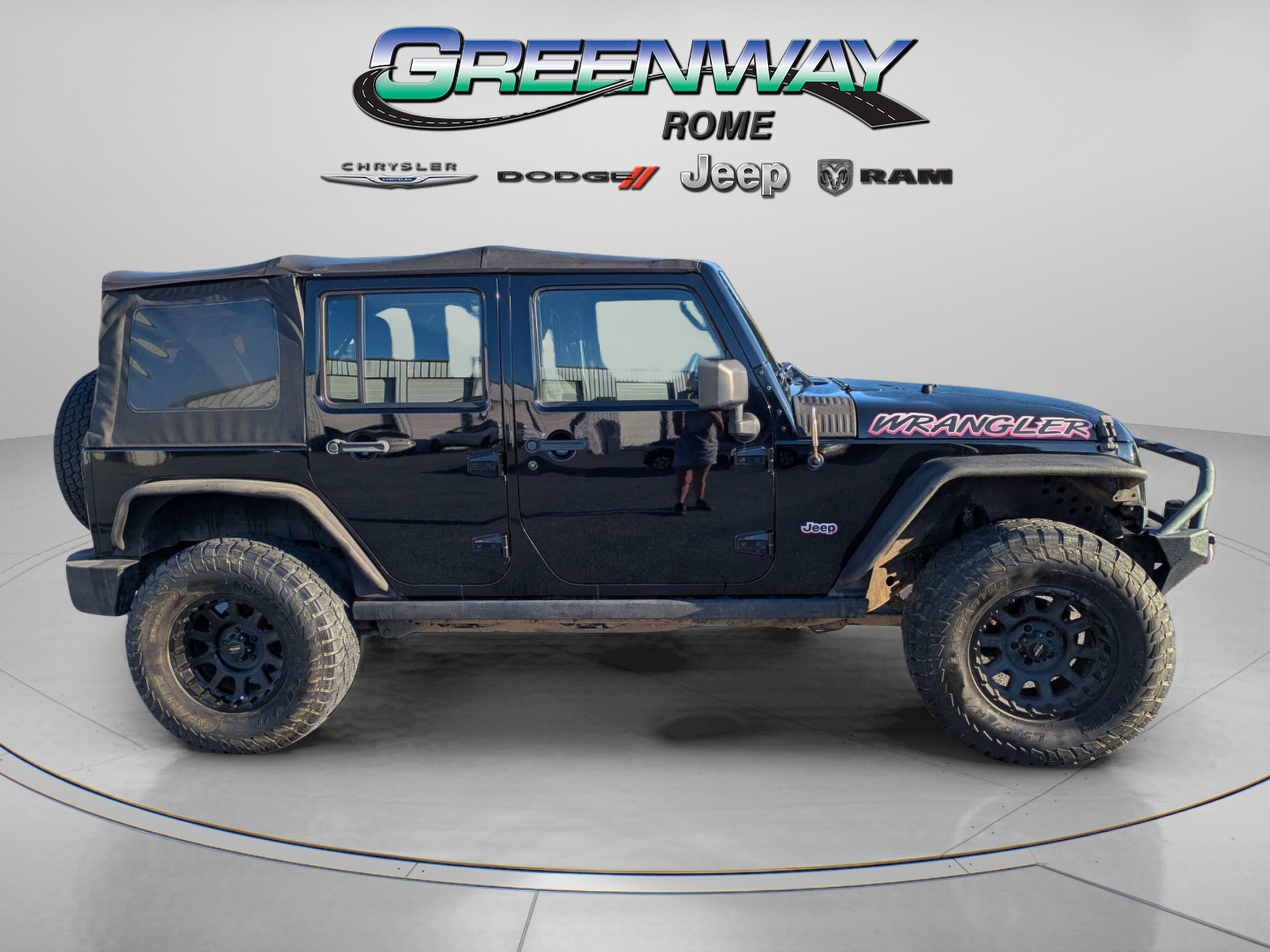 Used 2012 Jeep Wrangler Unlimited Sport w/ Connectivity Group AWD/4WD image 2
