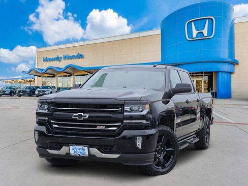 Used 2017 Chevrolet Silverado 1500 LTZ Z71 w/ Realtree Edition AWD/4WD image 1